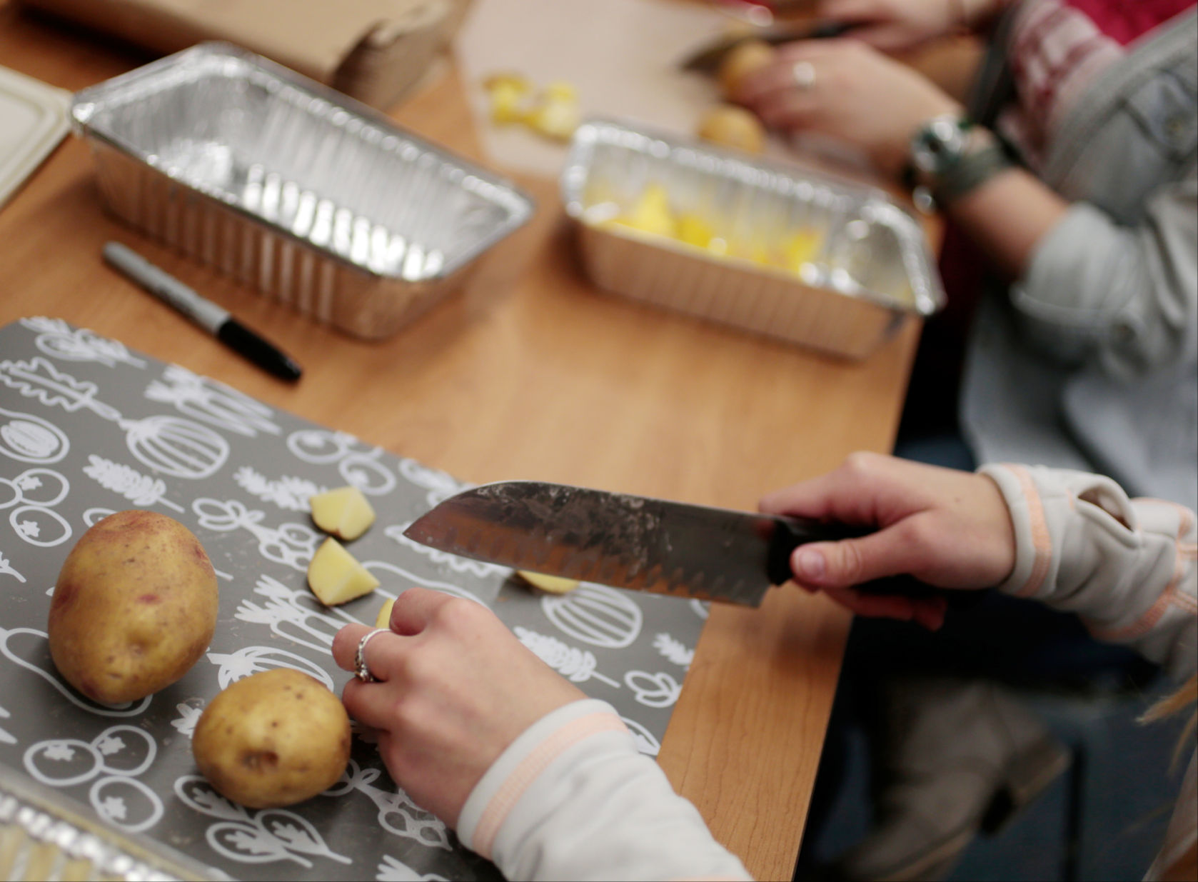 Cutting potatoes for tasting